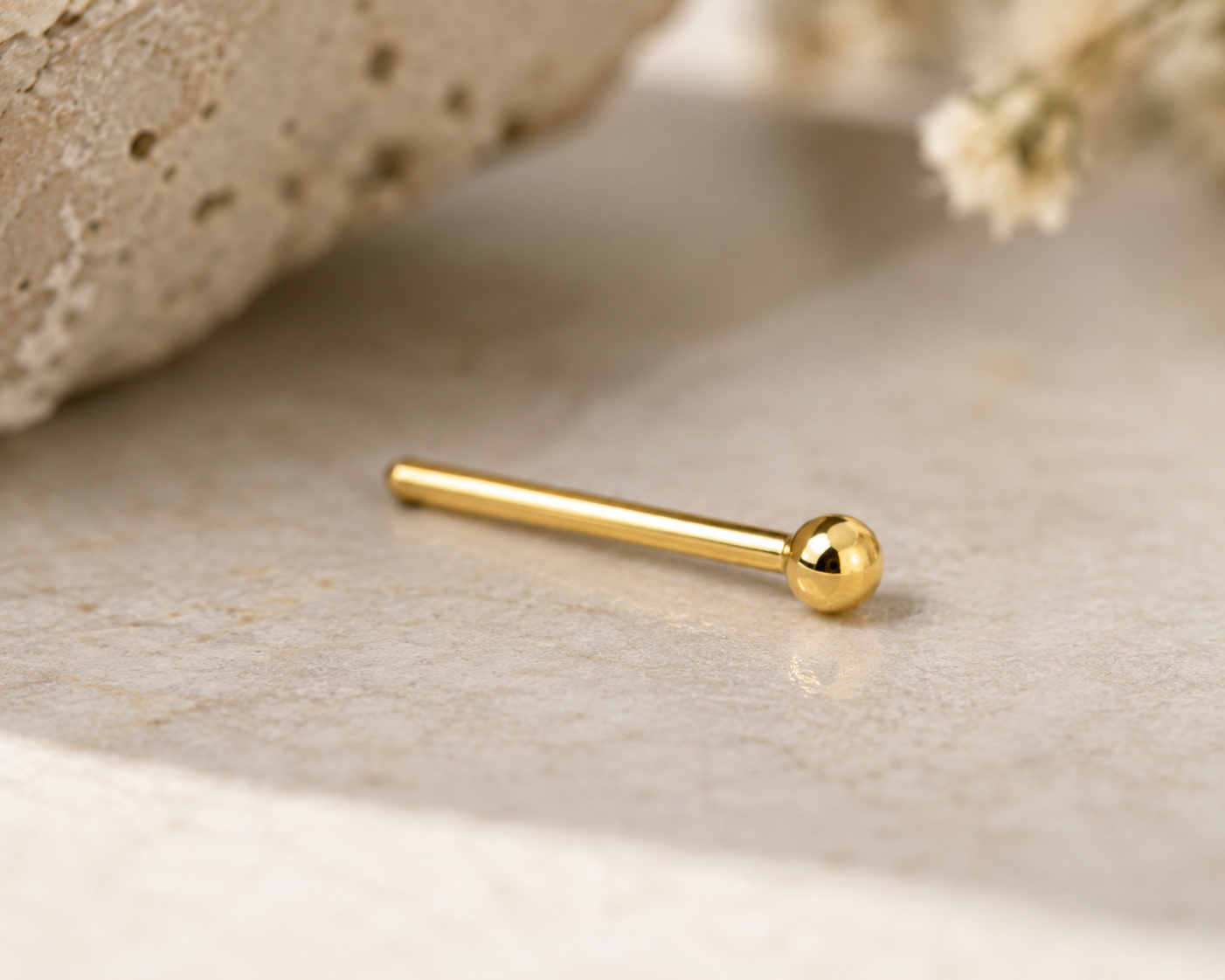 The Hayes Stud
Solid 14K Gold Nose Stud